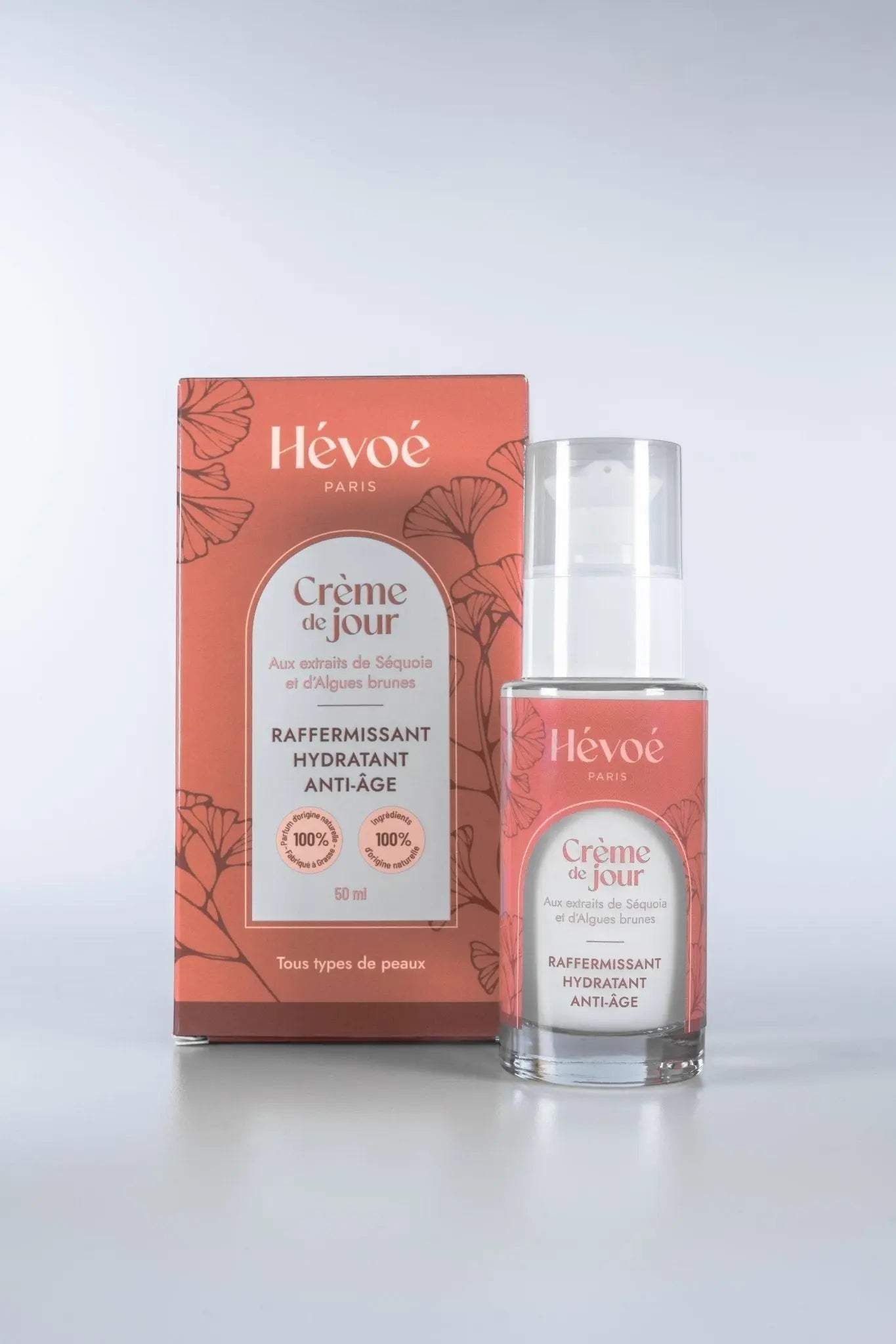 HEVOE Crème de Jour Raffermissante Hydratante Anti-Âge, 50 ml, 100% naturelle, flacon pompe en verre transparent.